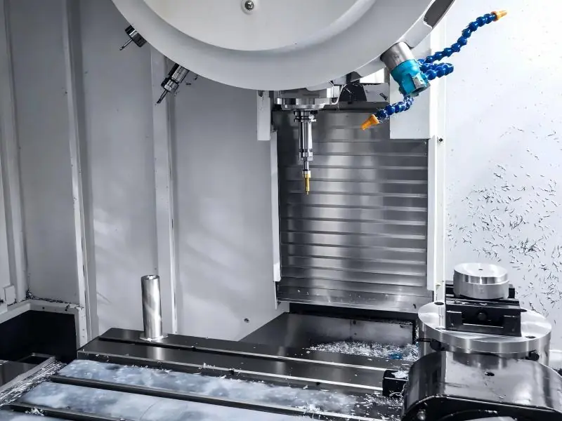5-axis CNC machining of a complex custom metal engine component.