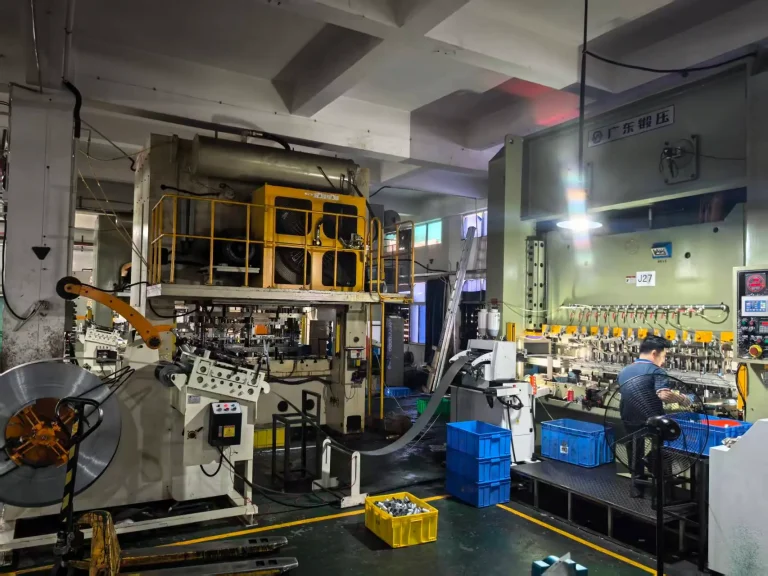 transfer die stamping process with independent stations for complex metal parts